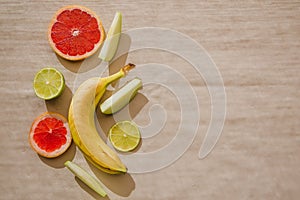 Tropical fruit flat lay on a light background.