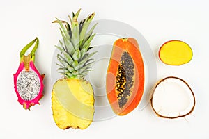 Tropical fruit flat lay on a white background