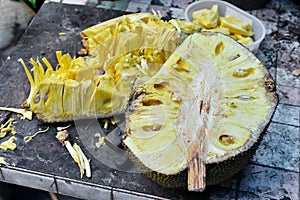 Tropical fruit, Jack fruit sliced on grunge table background
