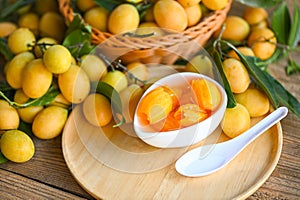 tropical fruit Name in Thailand sweet Yellow Marian Plum Maprang Plango or Mayong chid, Sweet dessert marian plum fruit on bowl