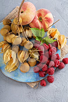 Tropical fruit plate with mango and peaches