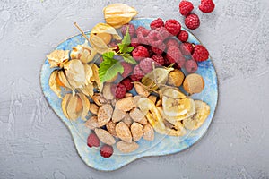 Tropical fruit plate with mango and peaches