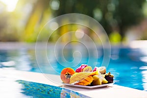 Tropical fruit at swimming pool