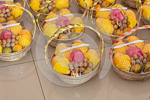 Tropical fruits in baskets at the market