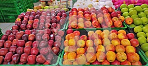 Tropical Fruits, Different kind of apples. Red apples, yellow apples, and green apples