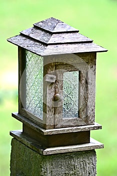 Tropical garden with lamp