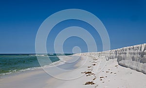 Tropical Gulf Coast ocean beach landscape scene.