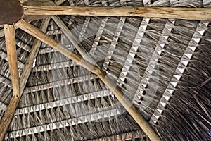 Tropical handmade coconut palm thatch roof for a beach kiosk in the summer