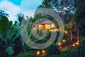 Tropical Home in the Jungle at Sunset