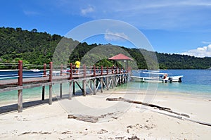 Tropical Island boat and jetty Kota Kinabalu