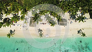 Tropical island. Exotic beach with palms around. Holiday and vacation concept