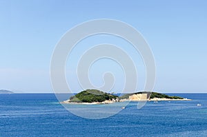 Tropical island in mediteranian sea photo