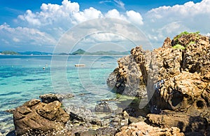 Tropical island rock on the beach with blue sky. Koh kham pattaya thailand