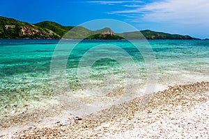 Tropical island rock on the beach with blue sky. Koh kham pattaya thailand