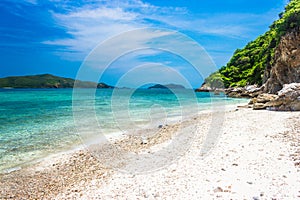 Tropical island rock on the beach with blue sky. Koh kham pattaya thailand