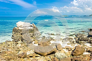 Tropical island rock on the beach with blue sky. Koh kham pattaya thailand