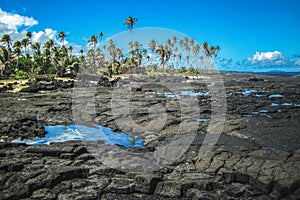 Tropical island of Samoa with Saleaula Lava Field near blowholes