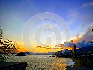 Tropical landscape of Acapulco beach, Mexico in the evening