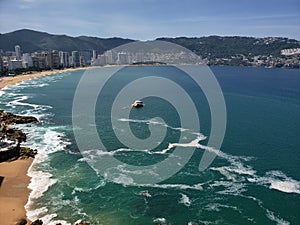 Tropical landscape of Acapulco beach, Mexico in the evening