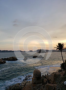 Tropical landscape of Acapulco beach, Mexico in the evening