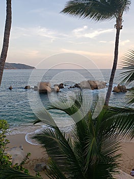 Tropical landscape of Acapulco beach, Mexico in the evening