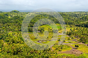 The tropical landscape around Chocolate hills on sunny day on Bohol