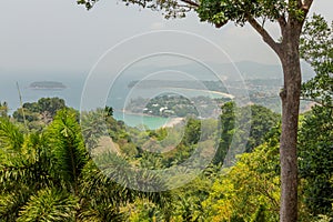 Tropical landscape of beautiful forest on the hill and ocean at background. Thailand. Asia.