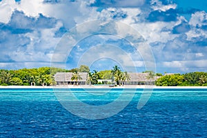 Tropical landscape of Maldives beach. Tropical sea bay. Background for summer holiday and vacation concept.