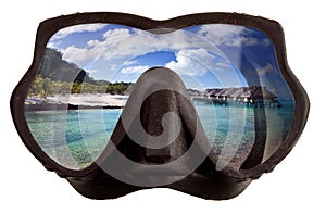 The tropical landscape is reflected in mask glasses for a snorkeling (diving)