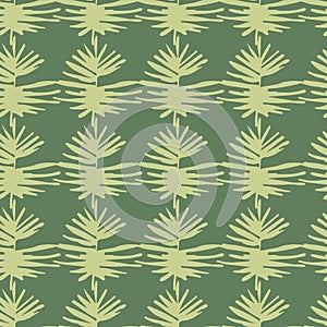 Tropical leaves exotic seamless pattern. Light yellow foliage silhouettes on green background. Hand drawn floral print