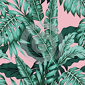 Tropical leaves green seamless pink background