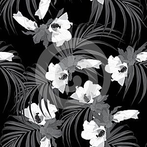 Tropical leaves and hibiscus flowers seamless pattern in black and white style.