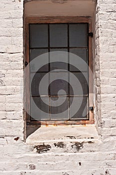 Tropical lighthouse window with twelve glass pains