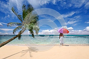 Tropical Location With Palm Tree and Woman