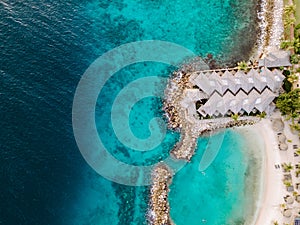 Tropical luxury resort Curacao with pirvate beach and palm trees, luxury vacation Curacao