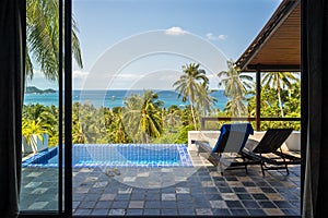 Tropical luxury villa with pool on patio balcony and sea view from the high