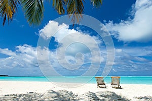 tropical Maldives island with white sandy beach