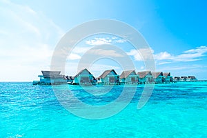 tropical Maldives resort hotel and island with beach and sea for holiday vacation concept