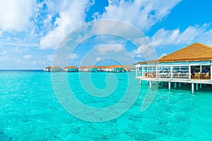 tropical Maldives resort hotel and island with beach and sea for holiday vacation concept