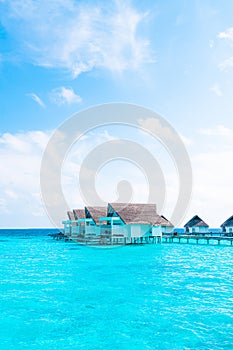 tropical Maldives resort hotel and island with beach and sea for holiday vacation concept