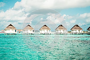 tropical Maldives resort hotel and island with beach and sea for holiday vacation concept