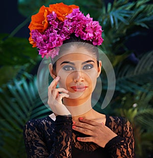 Tropical mystery. Portrait of an exotic beauty in tropical surroundings.