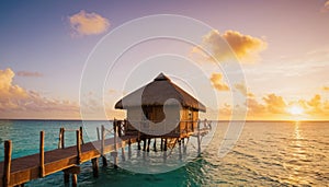 Tropical overwater bungalow at sunset