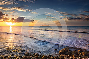 Tropical paradise: caribbean beach at golden sunset, Montego Bay, Jamaica