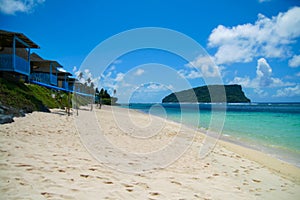 Tropical paradise polynesian style beachfront villas, beach resort on golden sand at Upolu Island, Samoa