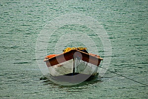 Tropical paradise typical scenery: colored wooden boats docked in the sea. Miches Bay or Sabana De La Mar lagoon, northern photo