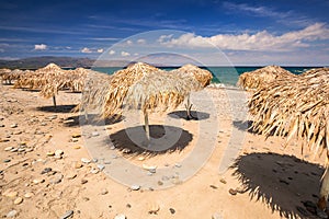 Tropical parasols at Maleme beach on Crete, Greece
