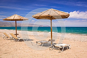 Tropical parasols at Maleme beach on Crete