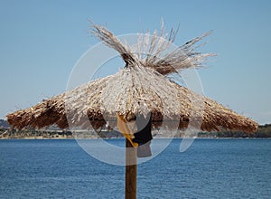 Tropical parasols on the Orellana dam beach photo