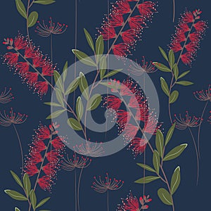 Tropical plants, paradise flowers and leaves seamless pattern on a dark blue background.